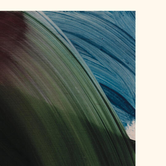 a neon sign of an ominous, skeletal hand holding onto an alluring glass of hard times whisky